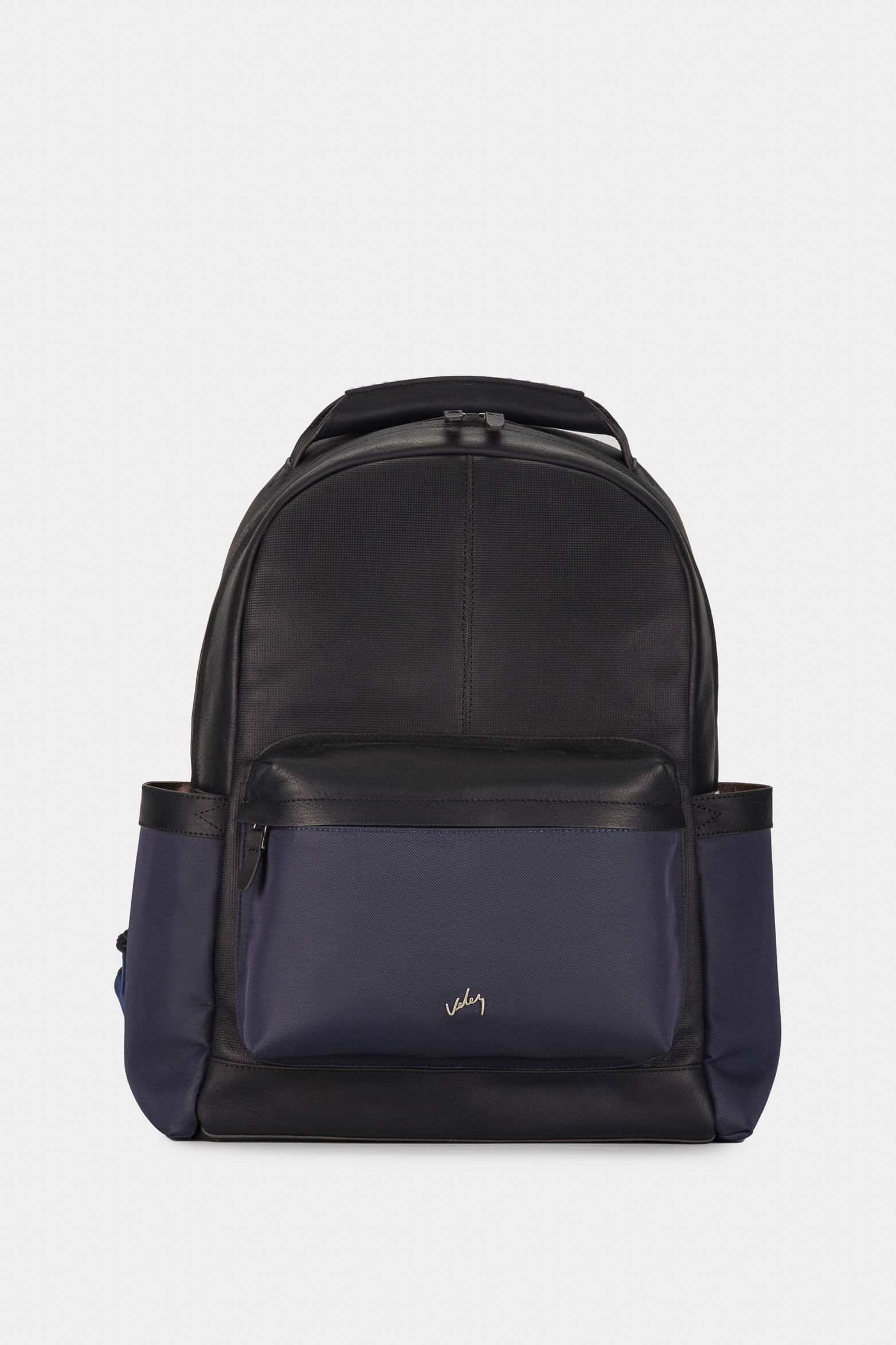 Morral San Patricio de cuero y lona para hombre aplique metálico